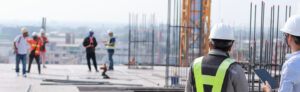 construction workers on a rooftop